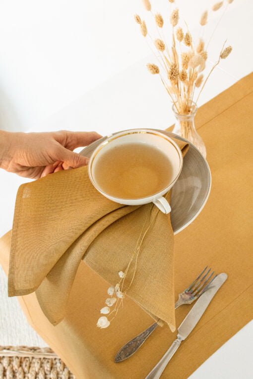 Honey mustard linen napkins for splendid table decor.