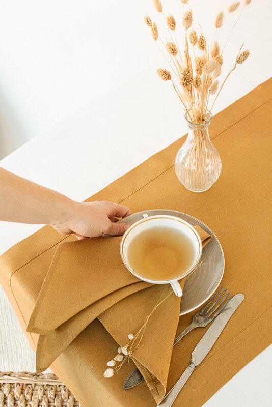 Honey mustard linen napkins for splendid table decor.