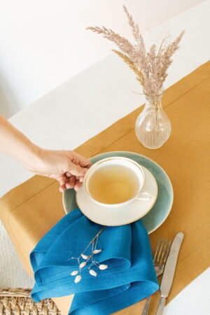 Sky blue stone washed linen napkins with simple hem.