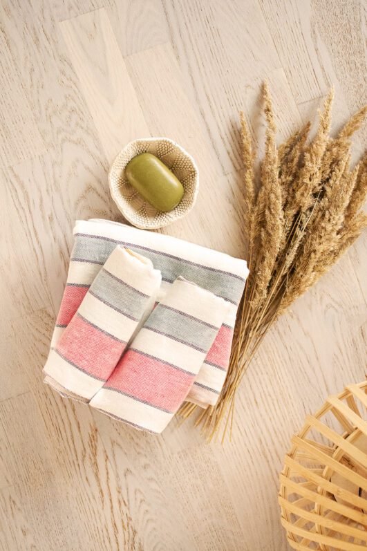 Striped heavy linen towels stipes goes through the towel with different pastel colors.
