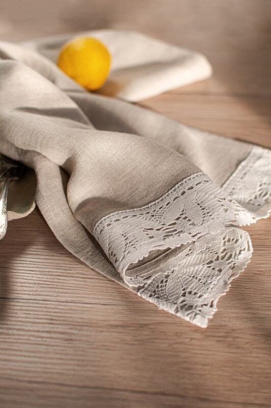 natural linen towels with off white wide lace on one edge.