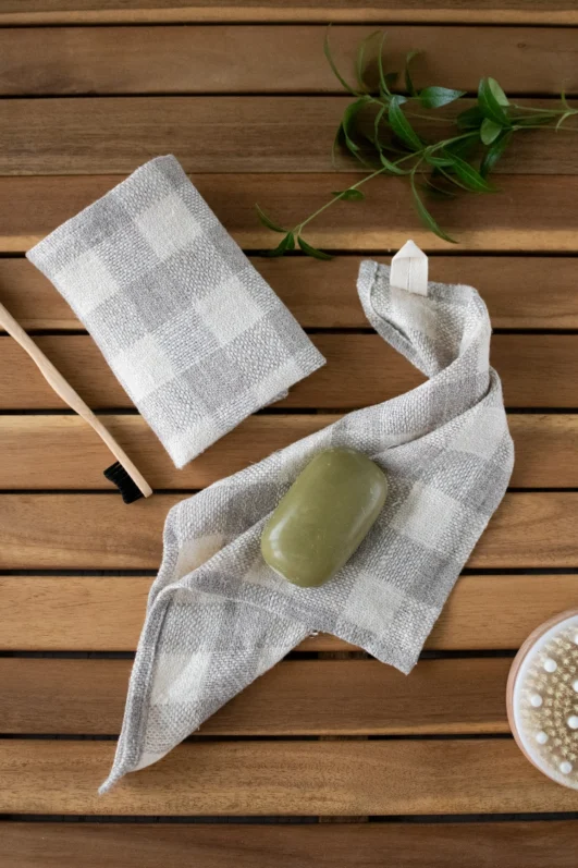 Small rustic heavy linen tartan towel with hanging loop.