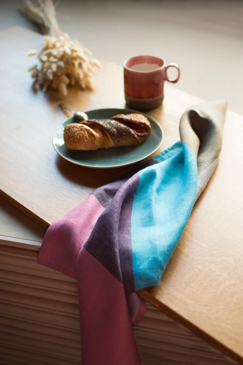 the one towels from the set with brighter hues - Bright pink, eggplant color, Turquoise blue, and coffee latte brown wide stripes.