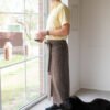 Brown linen long half apron is made with a slit on front and it helps to keep moving comfortable and the apron has the pockets on the sides. The belt is made long enough. Look great as cafe or restaurant apron.