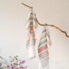 Off White heavy linen tea towels with pastel colors stripes. Great kitchen decor with hanging loop.