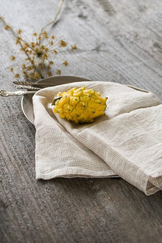 Light natural linen tea towels set to use in the kitchen like hand towels or dish cloth. towels are made from gingham fabric.