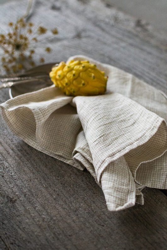 Light natural linen tea towels set to use in the kitchen like hand towels or dish cloth. towels are made from gingham fabric.