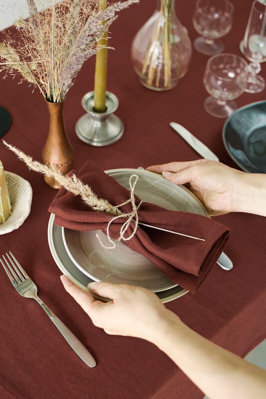 Rudy brown line napkins made from stone washed linen. YOU can find the same fabric tablecloth matching with napkins.