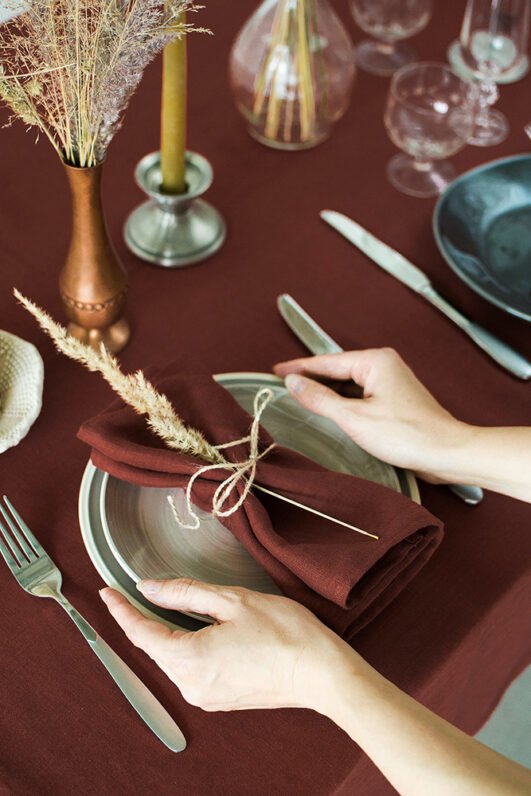 Rudy brown line napkins made from stone washed linen. YOU can find the same fabric tablecloth matching with napkins.