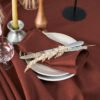 Rudy brown line napkins made from stone washed linen. YOU can find the same fabric tablecloth matching with napkins.