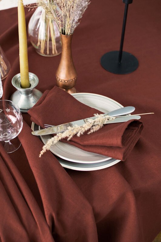 Rudy brown line napkins made from stone washed linen. YOU can find the same fabric tablecloth matching with napkins.