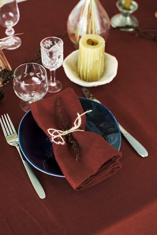 Rudy brown line napkins made from stone washed linen. YOU can find the same fabric tablecloth matching with napkins.