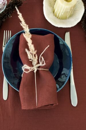 Rudy brown line napkins made from stone washed linen. YOU can find the same fabric tablecloth matching with napkins.