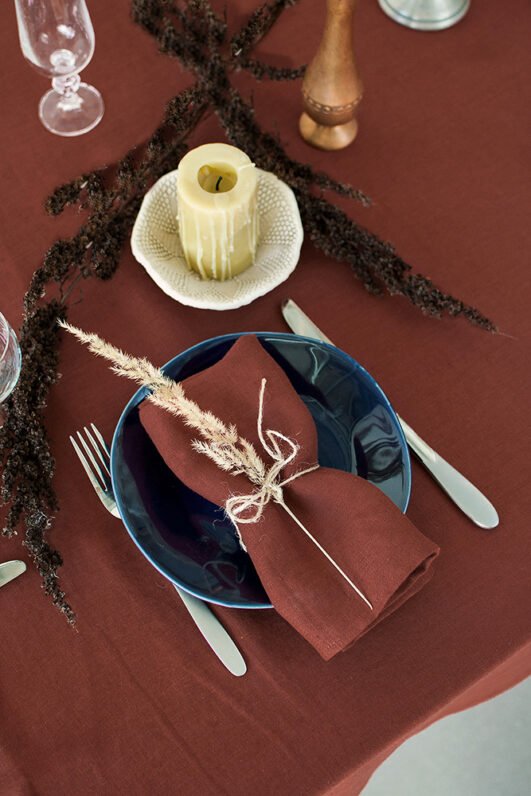 Rudy brown line napkins made from stone washed linen. YOU can find the same fabric tablecloth matching with napkins.