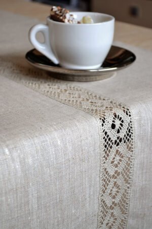 Light natural linen table runner with natural linen lace on the center of the table runner along the runner. Lace transparent and gauzy. Great decor for Your dinner table to special event.