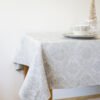 Natural white damask linen tablecloth with mitered corners. Luxury damask pattern looks perfect for special family occasion.