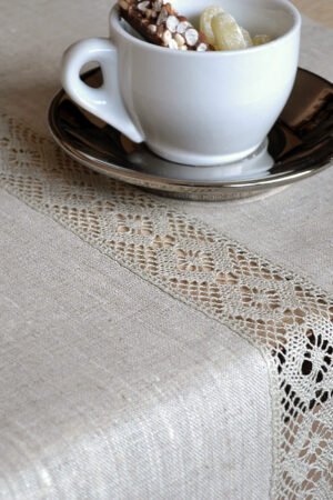 Light natural linen table runner with natural linen lace on the center of the table runner along the runner. Lace transparent and gauzy. Great decor for Your dinner table to special event.