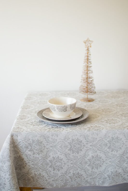 Natural white damask linen tablecloth with mitered corners. Luxury damask pattern looks perfect for special family occasion.