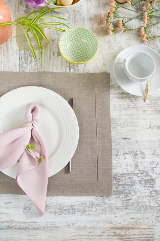 Elegant linen placemats in neutral tones (natural, light natural, off-white) with wide mitered corners. Perfect for casual or formal dining. Easaly to decor with Blush pink napkins for Easter table decor. Shop now for simple, natural table decor.