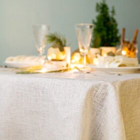 Wide linen tablecloth with gold sparkle great for special occasion like Christmas or wedding, anniversary.