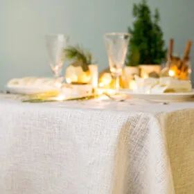 Wide linen tablecloth with gold sparkle great for special occasion like Christmas or wedding, anniversary.