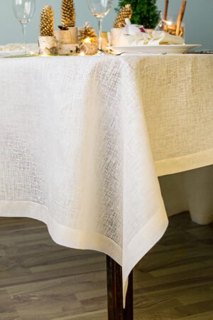 Wide linen tablecloth with gold sparkle great for special occasion like Christmas or wedding, anniversary.