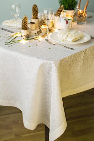 Wide linen tablecloth with gold sparkle great for special occasion like Christmas or wedding, anniversary.