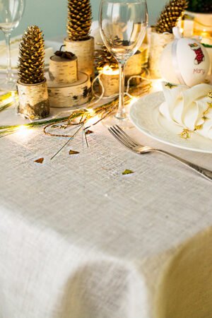 Linen tablecloth with gold sparkle great for special occasion like Christmas or wedding, anniversary.