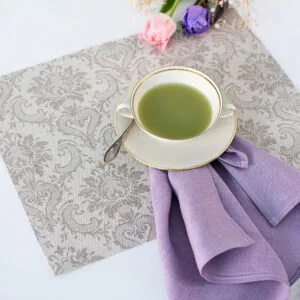 Damask linen placemats with mitered corners. Damak's pattern is woven from linen and cotton in natural shades. And easaly can be combined with our lavender napkins.