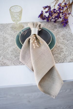 Damask linen placemats with mitered corners. Damak's pattern is woven from linen and cotton in natural shades. And easaly can be combined with our natural linen napkins.