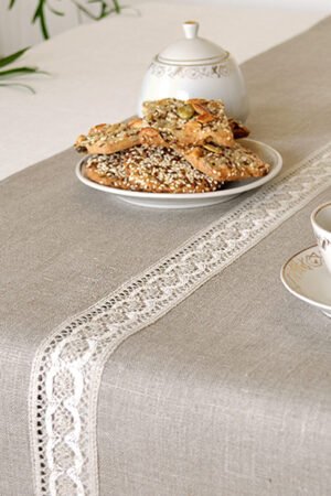 Natural linen table runner with the narrow white with natural linen lace on the center.