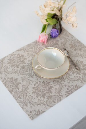 Damask linen placemats with mitered corners. Damak's pattern is woven from linen and cotton in natural shades.