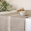 Natural linen table runner with the narrow white with natural linen lace on the center.