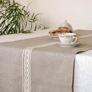 Natural linen table runner with the narrow white with natural linen lace on the center.