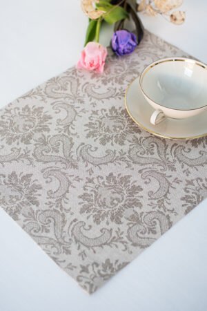 Damask linen placemats with mitered corners. Damak's pattern is woven from linen and cotton in natural shades.