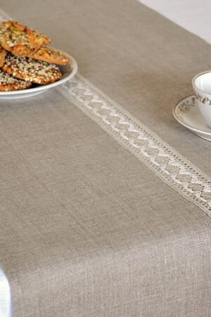 Natural linen table runner with the narrow white with natural linen lace on the center.