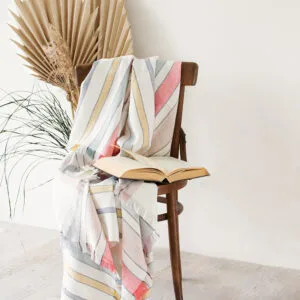 Off white linen blanket with stripes of colors soft and cozy for the couch covering or just use as sofa throw blanket. Blanket two edges are with fringes.